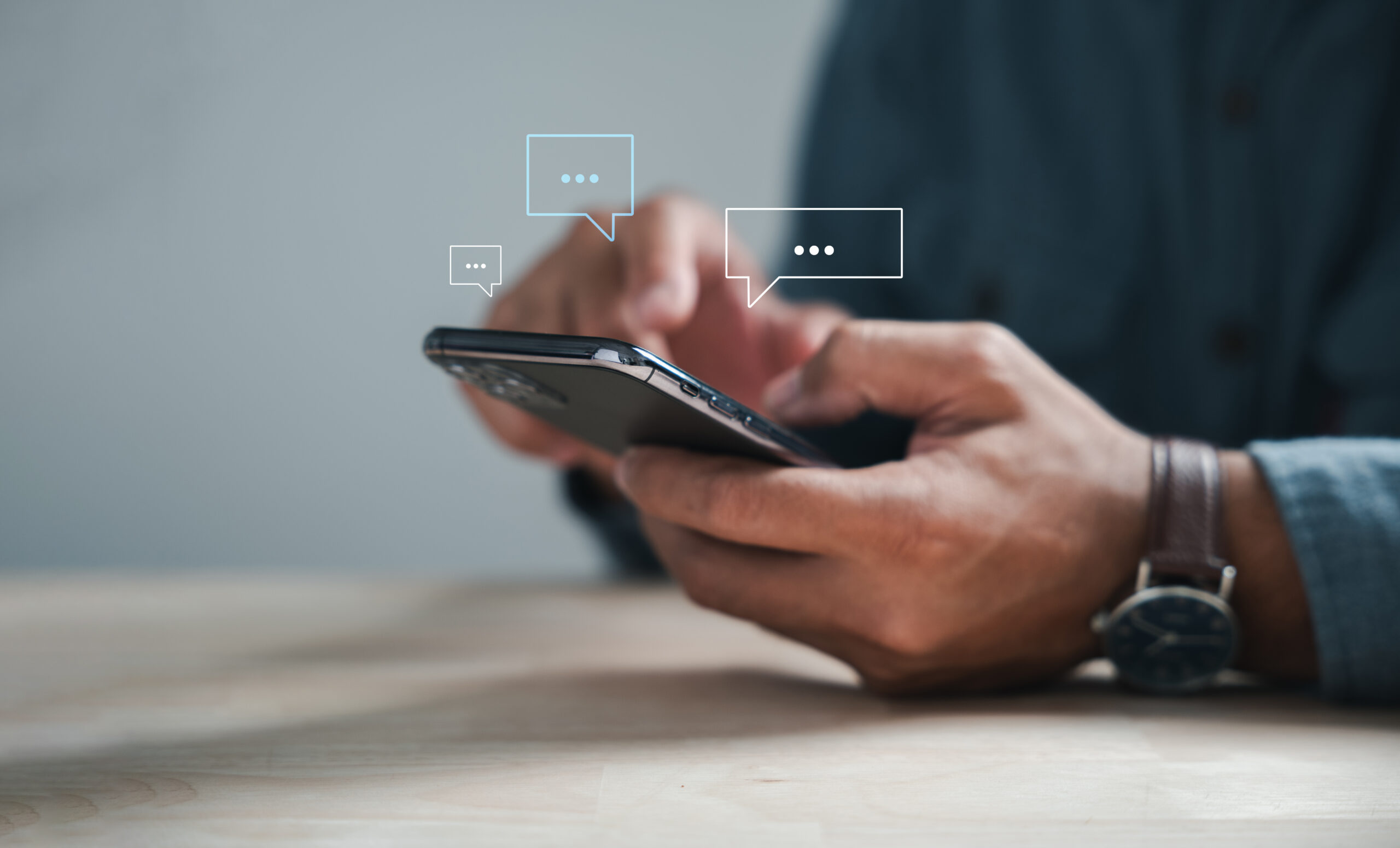 modern connectivity man phone types discussing live chat social network concepts home office with chat box icons portrays digital communication trends social media marketing technology scaled