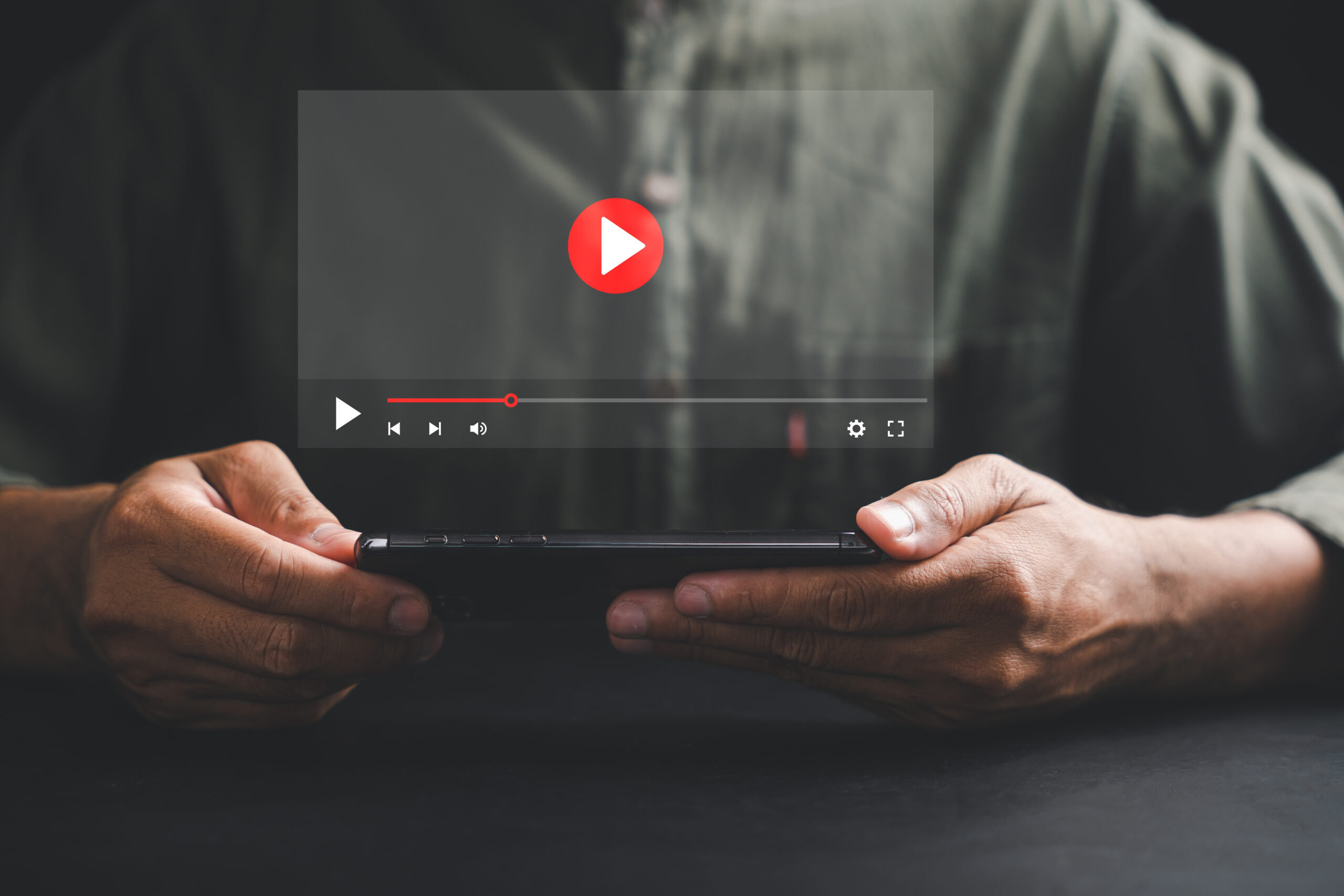 man enjoying video streaming virtual screen with smartphone scaled