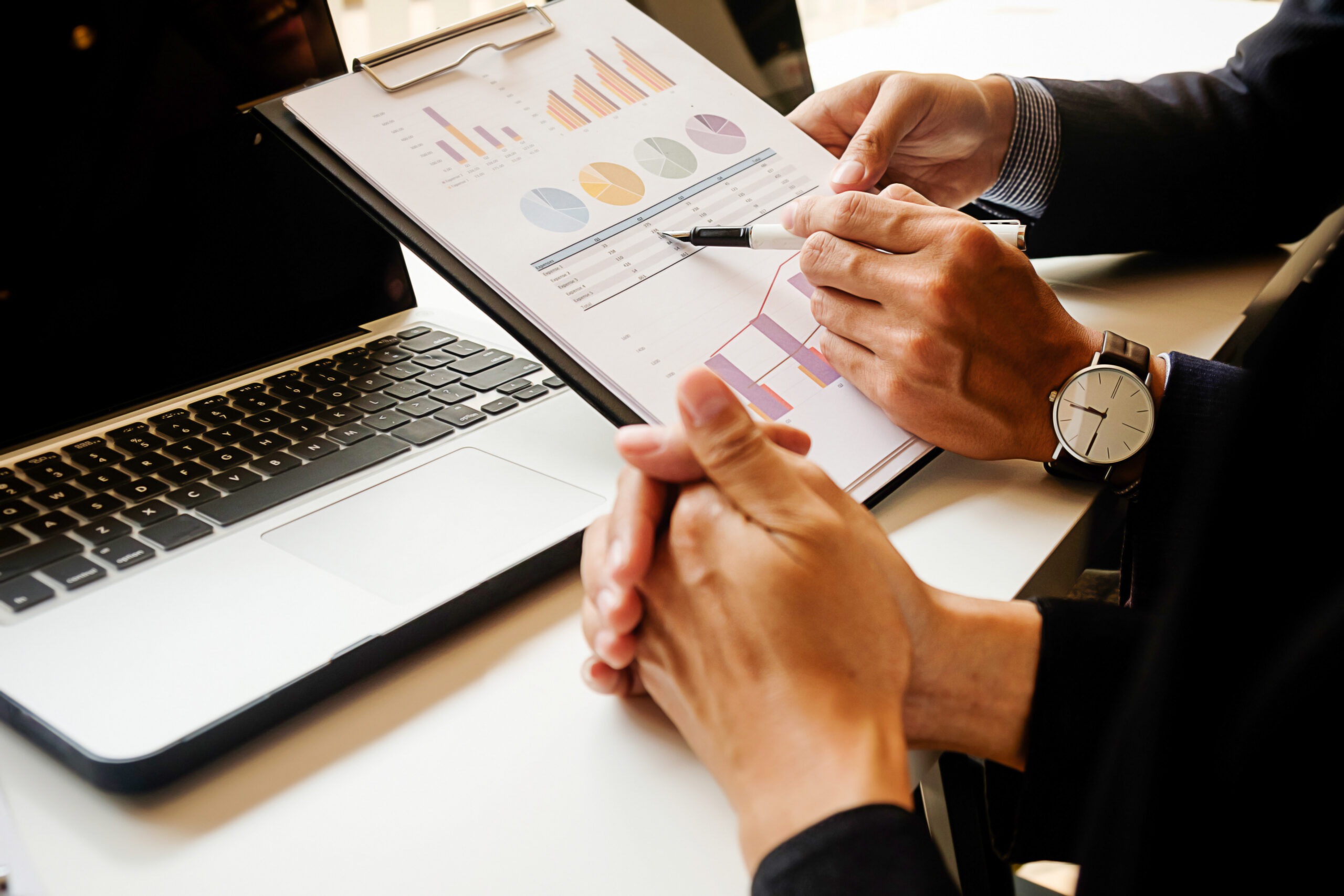 executive chart table laptop accounting report scaled